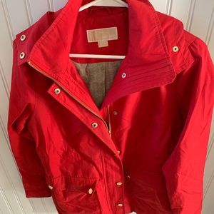 Red Michael Kors rain jacket